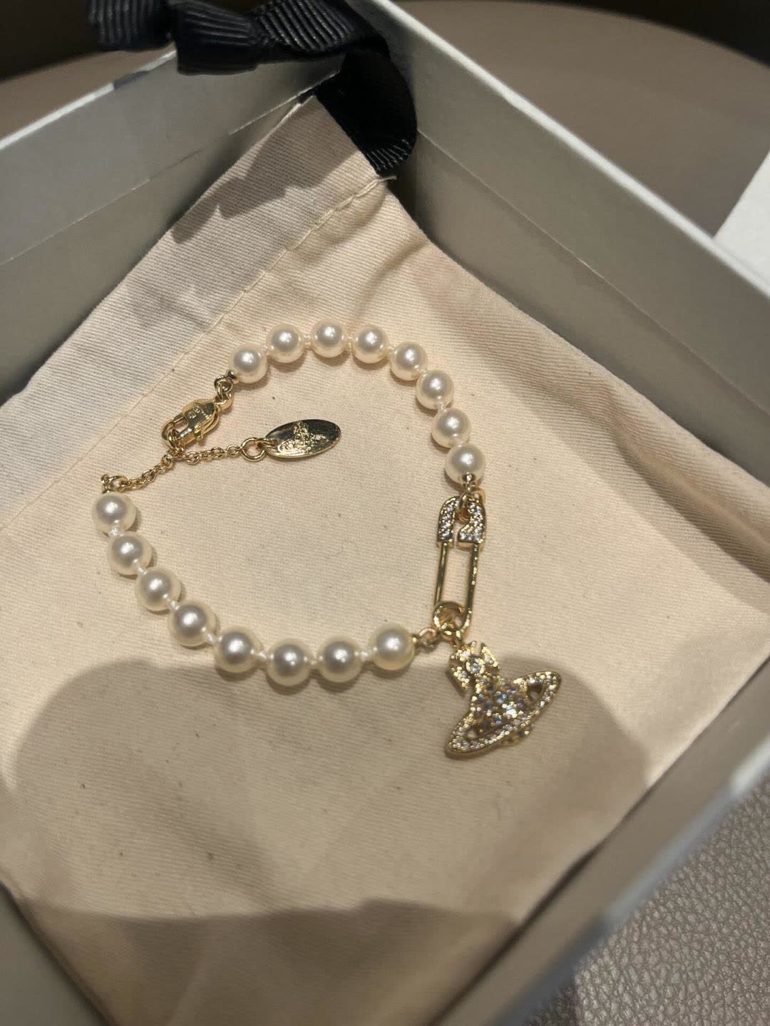 Vivienne Westwood Pearl Bracelet with Orb Charm